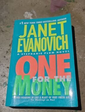 Paperbacks Janet Evanovich Teal Book with Yellow, Coral, and Lime Text